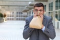 Businessman having a panic attack Royalty Free Stock Photo