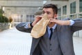 Businessman having a panic attack Royalty Free Stock Photo