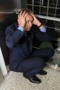 Businessman having panic attack in elevator Royalty Free Stock Photo