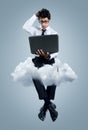 Businessman having problems with cloud computing technology Royalty Free Stock Photo