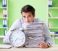 Businessman having problems with paperwork and workload Royalty Free Stock Photo