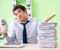 Businessman having problems with paperwork and workload Royalty Free Stock Photo