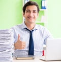 Businessman having problems with paperwork and workload Royalty Free Stock Photo
