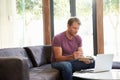 Businessman Having Working Lunch In Office Royalty Free Stock Photo