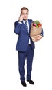 Businessman with healthy food, grocery buyer isolated Royalty Free Stock Photo