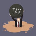 Businessman with heavy tax sinking in a quicksand Royalty Free Stock Photo