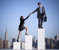 Businessman Helping Colleague Succeed Concept