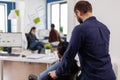 Businessman helping his disabled black colleague entering in company office Royalty Free Stock Photo