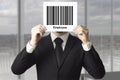 Businessman hiding face behind sign barcode employee