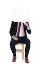 Businessman hiding his face behind a speech bubble Royalty Free Stock Photo