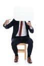 Businessman hiding his face behind a speech bubble Royalty Free Stock Photo