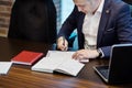 Businessman and his assistant Secretary in his office. The Secretary brought the boss documents to sign,Boss signs the documents Royalty Free Stock Photo