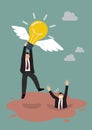 Businessman hold flying lightbulb get away from quicksand