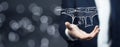 Businessman hold futuristic drone in hands