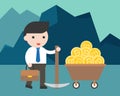 Businessman hold a pickaxe with bitcoin in money cart, cryptocurrency mining concept Royalty Free Stock Photo