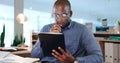 Businessman, hold and tablet while thinking in office, late and work on app, telemarketing or analytics. Black person