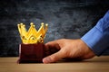 Businessman holding award trophy for show victory or winning first place Royalty Free Stock Photo