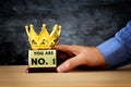 Businessman holding award trophy for show victory or winning first place Royalty Free Stock Photo