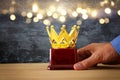 Businessman holding award trophy for show victory or winning first place Royalty Free Stock Photo