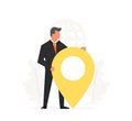 Businessman holding a big map pointer. Concept of navigation, office location, delivery.