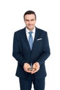 businessman holding bitcoins and smiling at camera