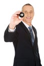 Businessman holding black billiard ball Royalty Free Stock Photo