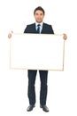 Businessman holding blank banner Royalty Free Stock Photo