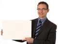 Businessman holding a blank sign Royalty Free Stock Photo