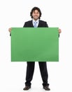 Businessman holding blank sign