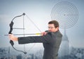 Businessman holding bow and arrow while aiming Royalty Free Stock Photo