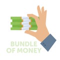 Businessman holding a bundle of money. Royalty Free Stock Photo