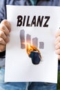 Businessman is holding a burning paper Royalty Free Stock Photo