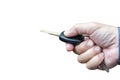 Businessman holding a car key Isolated on white background Royalty Free Stock Photo