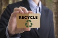 Businessman holding card message recycle, reduce, reuse. Royalty Free Stock Photo