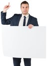 Businessman holding card and pointing Royalty Free Stock Photo