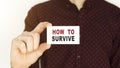 card with text HOW TO SURVIVE Royalty Free Stock Photo