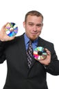 Businessman holding CDs Royalty Free Stock Photo
