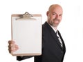 Businessman holding clipboard