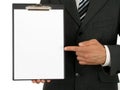 Businessman Holding Clipboard