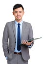 Businessman holding clipboard Royalty Free Stock Photo