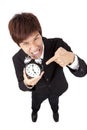 Businessman holding a clock Royalty Free Stock Photo