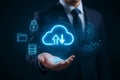 Businessman Holding Cloud Computing Icon with Data Upload and Download Concept Royalty Free Stock Photo