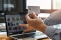 Businessman holding credit card and using laptop. Making payment while online shopping. E-commerce and modern technology concept Royalty Free Stock Photo