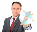 Businessman holding dvd Royalty Free Stock Photo