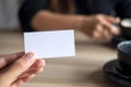 A businessman holding an empty business card with businesswoman Royalty Free Stock Photo