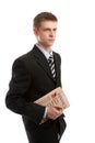 Businessman holding financial paper