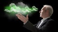 Businessman holding glowing green cloud representing eco cloud computing Royalty Free Stock Photo