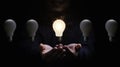 Businessman holding glowing lightbulb for creative thinking and problem solving concept Royalty Free Stock Photo