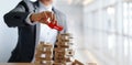 Businessman holding GOALS word on wooden blocks. Financial