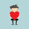 Businessman holding heart shape Royalty Free Stock Photo